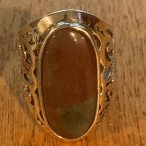 Large Mexican silver statement ring stone is reddish with a bit of green